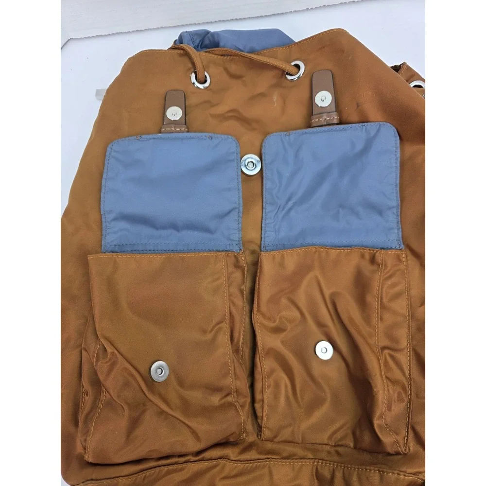 Tumi 48787 Voyageur Basel Backpack in a brown‎ nylon material